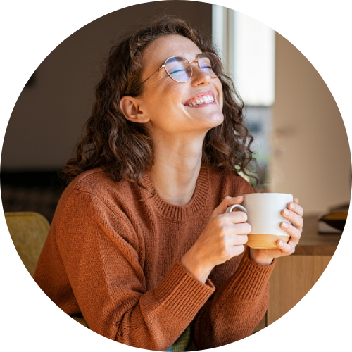 happy woman holding coffee